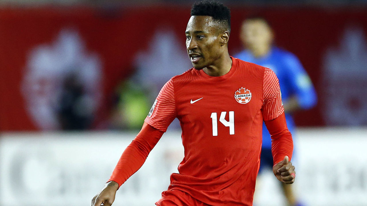 TORONTO, ON - SEPTEMBER 08: Mark-Anthony Kaye #14 of Canada passes the ball during a 2022 World Cup Qualifying match against El Salvador at BMO Field on September 8, 2021 in Toronto, Ontario, Canada.