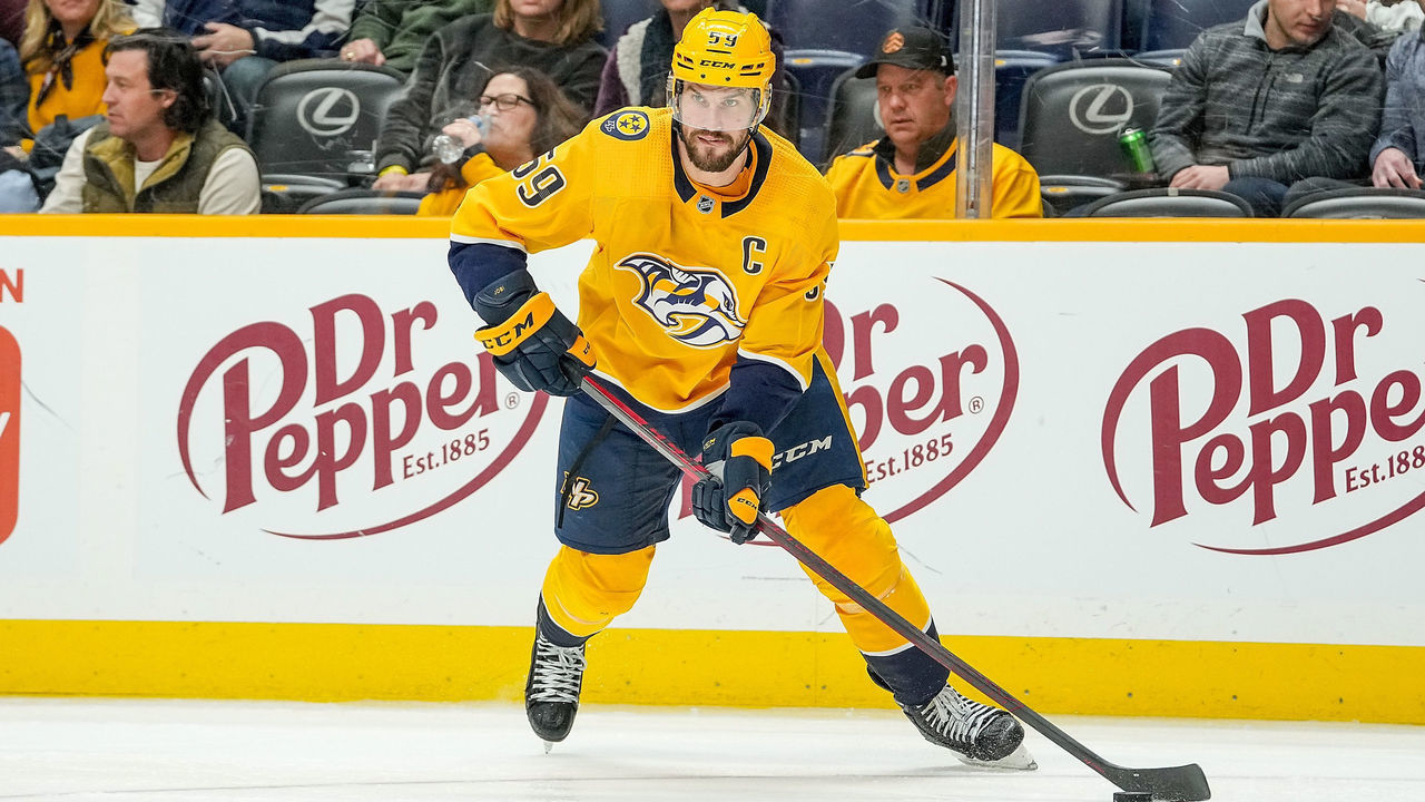 NASHVILLE, TN - JANUARY 13: Roman Josi #59 of the Nashville Predators skates against the Buffalo Sabres during an NHL game at Bridgestone Arena on January 13, 2022 in Nashville, Tennessee.