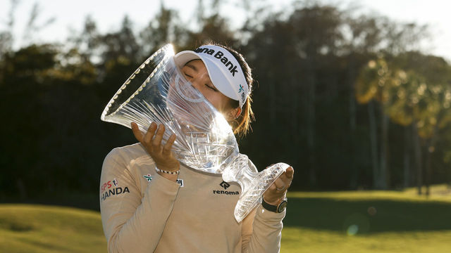 BOCA RATON, FLORIDA - JANUARY 30: Lydia Ko of New Zealand kisses the trophy after winning the 2022 Gainbridge LPGA at Boca Rio Golf Club on January 30, 2022 in Boca Raton, Florida.