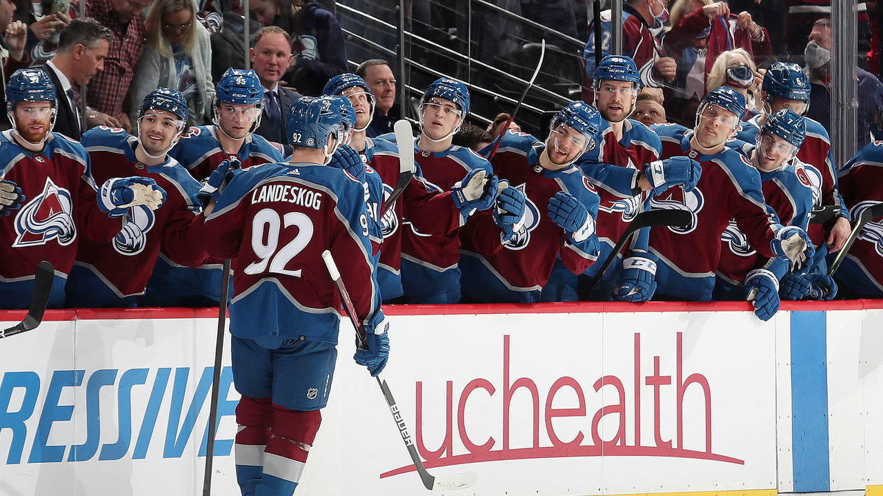 DENVER, COLORADO - JANUARY 30: Gabriel Landeskog #92 of the Colorado Avalanche celebrates a goal against the Buffalo Sabres with his bench at Ball Arena on January 30, 2022 in Denver, Colorado.
