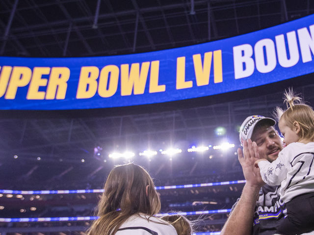 Los Angeles, CA - January 30: Rams offensive tackle Rob Havenstein gets a high-five from his daughter as he and his family celebrates their 20-17 victory over the San Francisco 49ers in the NFC Championships, winning them a berth in the Super Bowl against the Bengals at SoFi Stadium on Sunday, Jan. 30, 2022 in Los Angeles, CA. (Allen J. Schaben / Los Angeles Times via Getty Images)