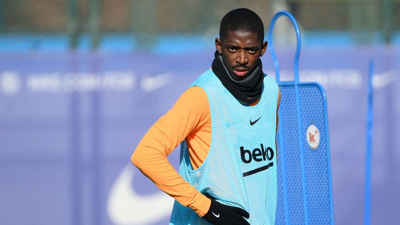 Barcelona's French forward Ousmane Dembele looks on during a training session at the Joan Gamper training ground in Sant Joan Despi near Barcelona, on January 22, 2022 on the eve of the Spanish League football match against Alaves. - Ousmane Dembele hit back at Barcelona on January 20, 2022 by saying he "won't give in to blackmail" after the club's director of football Mateu Alemany said the winger must leave before the end of January.