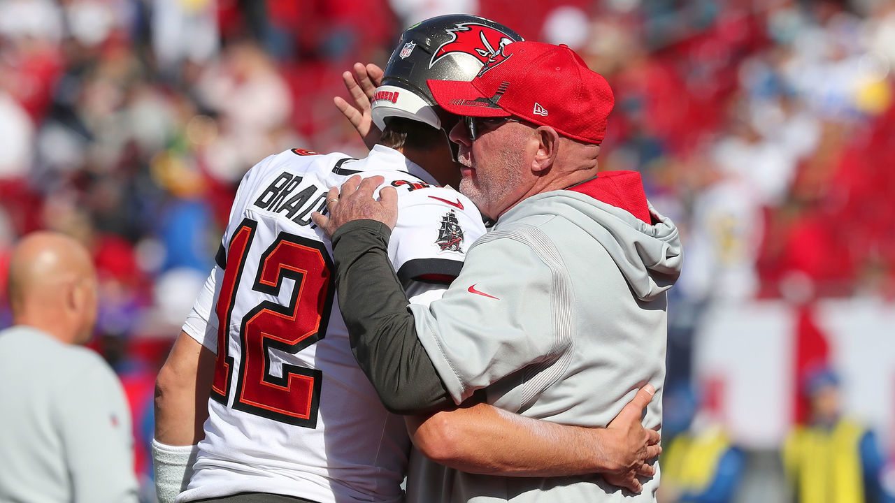 TAMPA, FL - JANUARY 23: Tampa Bay Buccaneers Quarterback Tom Brady (12) and Head Coach Bruce Arians greet one another before the NFC Divisional game between the Los Angeles Rams and the Tampa Bay Buccaneers on January 23, 2022 at Raymond James Stadium in Tampa, Florida.