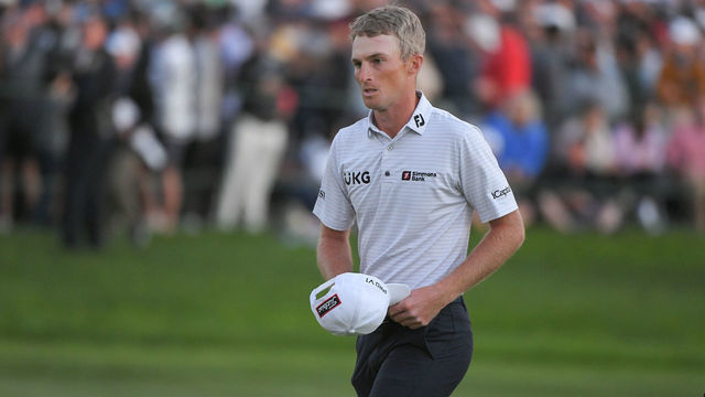 SAN DIEGO, CA - JANUARY 29: Will Zalatoris walks off the 18th green during the final round of the Farmers Insurance Open at Torrey Pines South on January 29, 2022 in San Diego, California.