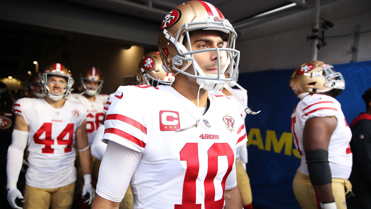 INGLEWOOD, CALIFORNIA - JANUARY 30: Jimmy Garoppolo #10 of the San Francisco 49ers prepares to take the field with teammates before the NFC Championship Game against the Los Angeles Rams at SoFi Stadium on January 30, 2022 in Inglewood, California.