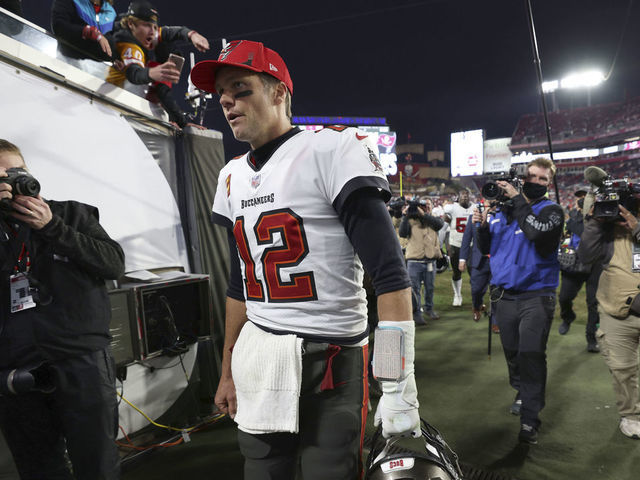 Football: NFL Playoffs: Tampa Bay Buccaneers QB Tom Brady walking off field after game vs Los Angeles Rams at Raymond James Stadium. Tampa, FL 1/23/2022 CREDIT: Simon Bruty