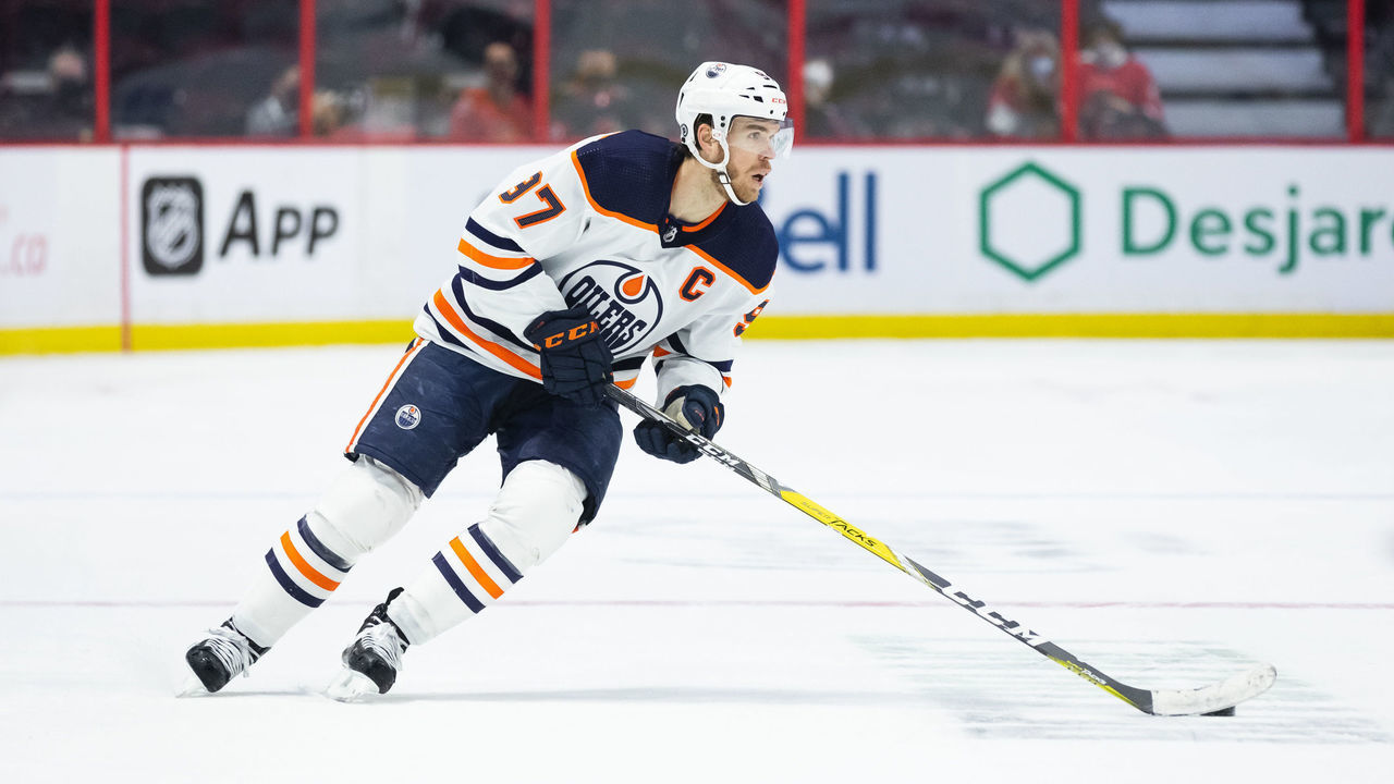 OTTAWA, ON - JANUARY 31: Connor McDavid #97 of the Edmonton Oilers skates against the Ottawa Senators at Canadian Tire Centre on January 31, 2022 in Ottawa, Ontario, Canada.
