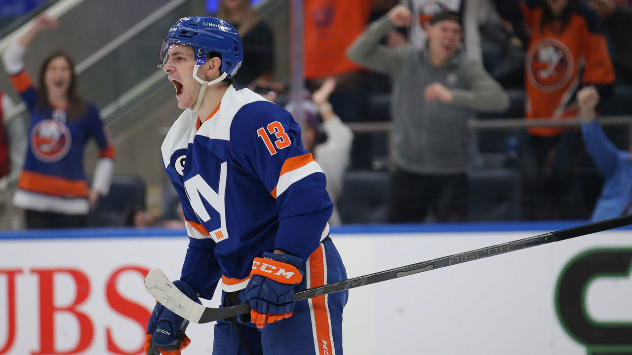 ELMONT, NEW YORK - FEBRUARY 1: Mathew Barzal #13 of the New York Islanders celebrates his goal against the Ottawa Senators during the second period at UBS Arena on February 1, 2022 in Elmont, New York.