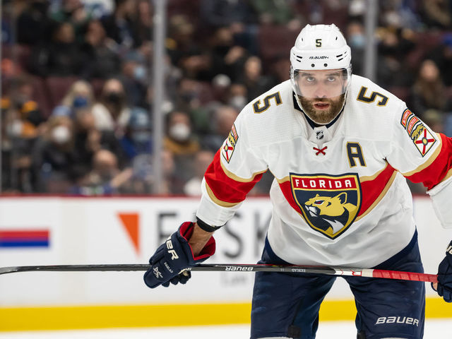 VANCOUVER, BC - JANUARY 21: Florida Panthers defenseman Aaron Ekblad (5) waits for a face-off during their NHL game against the Vancouver Canucks at Rogers Arena on January 21, 2022 in Vancouver, British Columbia, Canada.