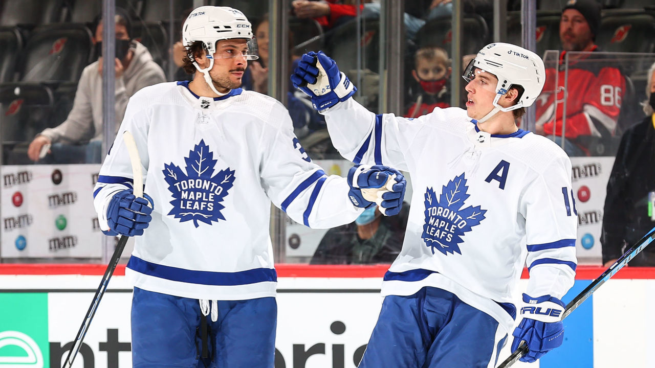 NEWARK, NJ - FEBRUARY 01: Auston Matthews #34 of the Toronto Maple Leafs celebrates after scoring with teammate Mitchell Marner #16 during the first period against the New Jersey Devils on February 1, 2022 at the Prudential Center in Newark, New Jersey.
