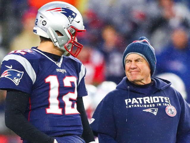 FOXBOROUGH, MA - NOVEMBER 24: Tom Brady #12 talks to head coach Bill Belichick of the New England Patriots before a game against the Dallas Cowboys at Gillette Stadium on November 24, 2019 in Foxborough, Massachusetts.