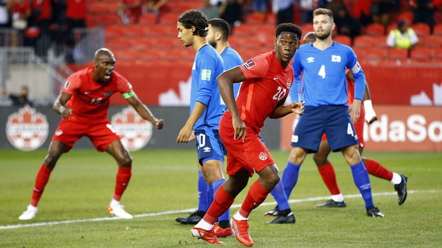TORONTO, ON - SEPTEMBER 08: Jonathan David #20 of Canada celebrates his goal with Atiba Hutchinson #13 during a 2022 World Cup Qualifying match against El Salvador at BMO Field on September 8, 2021 in Toronto, Ontario, Canada.