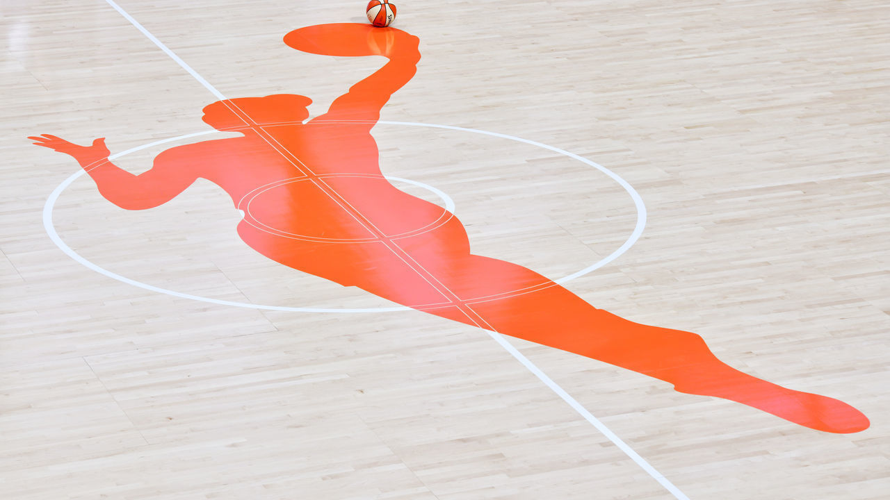 PALMETTO, FLORIDA - AUGUST 12: A game ball rests on the edge of the WNBA logo on the court of a game between the Chicago Sky and the Phoenix Mercury at Feld Entertainment Center on August 12, 2020 in Palmetto, Florida.