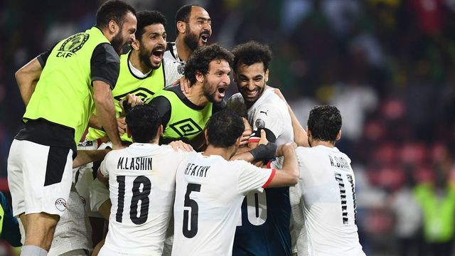 Egypt's players celebrate after winning the Africa Cup of Nations (CAN) 2021 semi-final football match between Cameroon and Egypt at Stade d'Olembe in Yaounde on February 3, 2022.