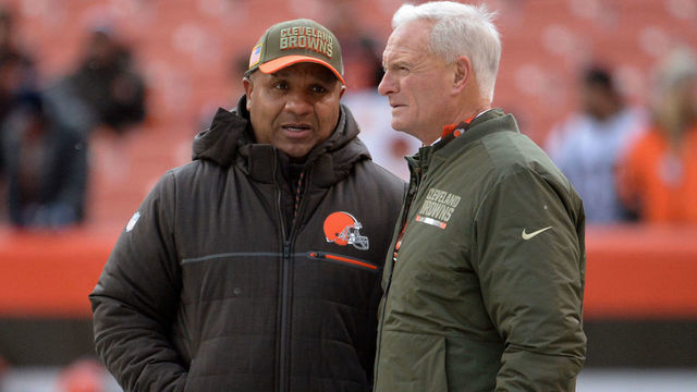 CLEVELAND, OH - NOVEMBER 19, 2017: Head coach Hue Jackson (L) and owner Jimmy Haslam (R) of the Cleveland Browns converse on the sideline prior to a game on November 19, 2017 against the Jacksonville Jaguars at FirstEnergy Stadium in Cleveland, Ohio. Jacksonville won 19-7. (Photo by: 2017 Nick Cammett/Diamond Images/Getty Images)