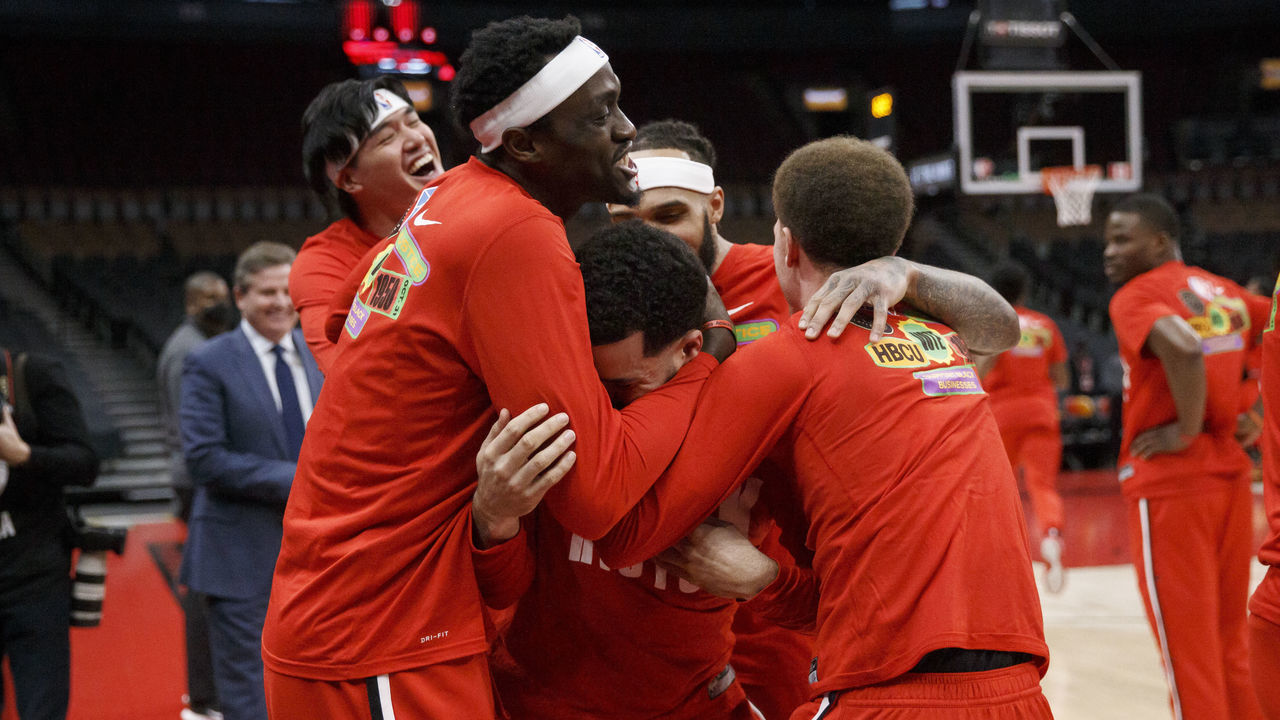 TORONTO, ON - FEBRUARY 03: Pascal Siakam #43 and Malachi Flynn #22 of the Toronto Raptors congratulate Fred VanVleet #23 as hes announced to be on the All-Star team prior to their NBA game against the Chicago Bulls at Scotiabank Arena on February 3, 2022 in Toronto, Canada.