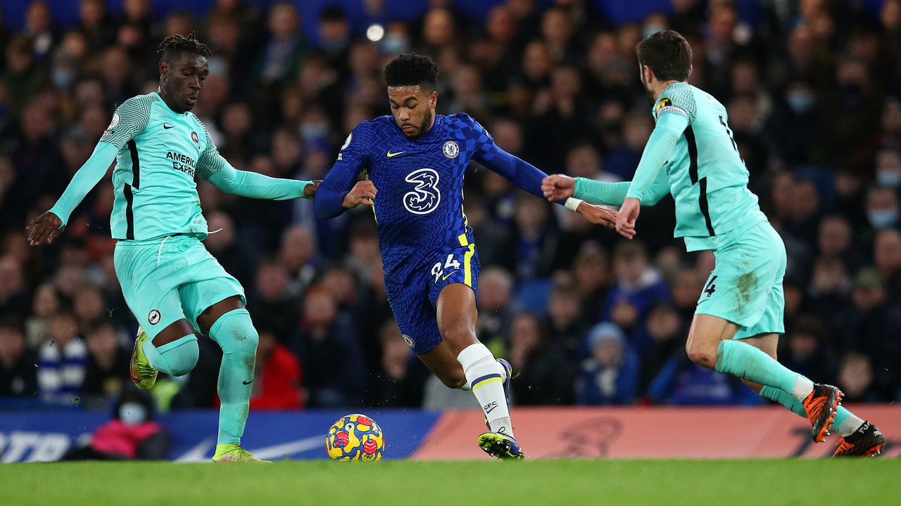 LONDON, ENGLAND - DECEMBER 29: Reece James of Chelsea takes on Yves Bissouma and Adam Lallana of Brighton during the Premier League match between Chelsea and Brighton & Hove Albion at Stamford Bridge on December 29, 2021 in London, England.
