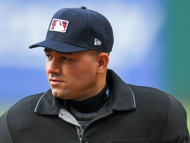 CLEVELAND, OH - JULY 03, 2021: Home plate umpire Roberto Ortiz looks prior to a game between the Houston Astros and Cleveland Indians at Progressive Field on July 03, 2021 in Cleveland, Ohio.