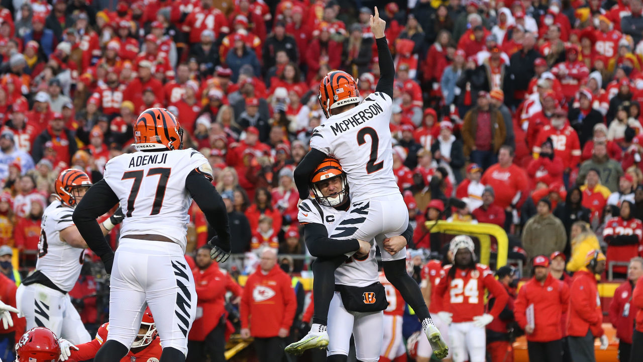 KANSAS CITY, MO - JANUARY 30: Cincinnati Bengals punter Kevin Huber (10) lifts kicker Evan McPherson (2) into air after making a game-winning 31-yard field goal in overtime of the AFC Championship game between the Cincinnati Bengals and Kansas City Chiefs on Jan 30, 2022 at GEHA Field at Arrowhead Stadium in Kansas City, MO.