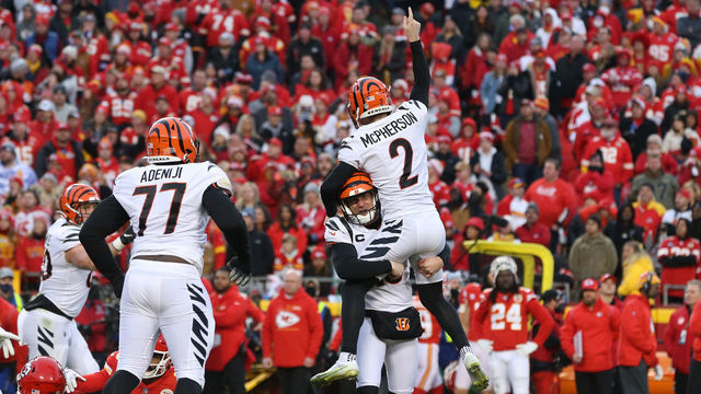 KANSAS CITY, MO - JANUARY 30: Cincinnati Bengals punter Kevin Huber (10) lifts kicker Evan McPherson (2) into air after making a game-winning 31-yard field goal in overtime of the AFC Championship game between the Cincinnati Bengals and Kansas City Chiefs on Jan 30, 2022 at GEHA Field at Arrowhead Stadium in Kansas City, MO.