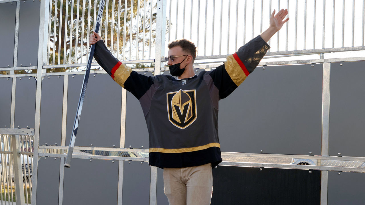 LAS VEGAS, NEVADA - NOVEMBER 08: Newly acquired Vegas Golden Knights player Jack Eichel celebrates a kid's goal as he participates in a youth clinic at a ball hockey rink at the Boys & Girls Clubs of Southern Nevada on November 8, 2021 in North Las Vegas, Nevada. The Golden Knights traded for Eichel and a conditional draft pick from the Buffalo Sabres in exchange for Alex Tuch, Peyton Krebs and two conditional draft picks on November 4. Eichel is expected to be available four months after undergoing an artificial disc replacement surgery in his neck.