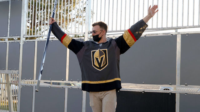 LAS VEGAS, NEVADA - NOVEMBER 08: Newly acquired Vegas Golden Knights player Jack Eichel celebrates a kid's goal as he participates in a youth clinic at a ball hockey rink at the Boys & Girls Clubs of Southern Nevada on November 8, 2021 in North Las Vegas, Nevada. The Golden Knights traded for Eichel and a conditional draft pick from the Buffalo Sabres in exchange for Alex Tuch, Peyton Krebs and two conditional draft picks on November 4. Eichel is expected to be available four months after undergoing an artificial disc replacement surgery in his neck.