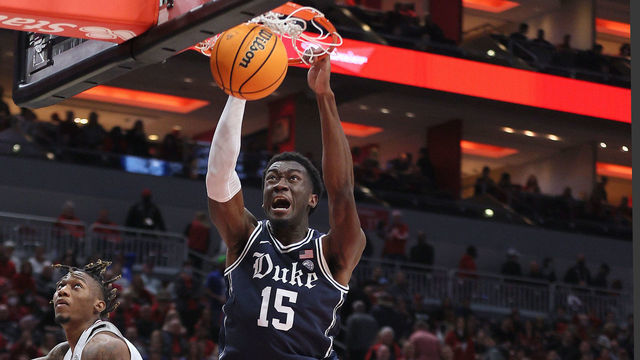 LOUISVILLE, KENTUCKY - JANUARY 29: Mark Williams #15 of the Duke Blue Devils shoots the ball against the Louisville Cardinals at KFC YUM! Center on January 29, 2022 in Louisville, Kentucky.