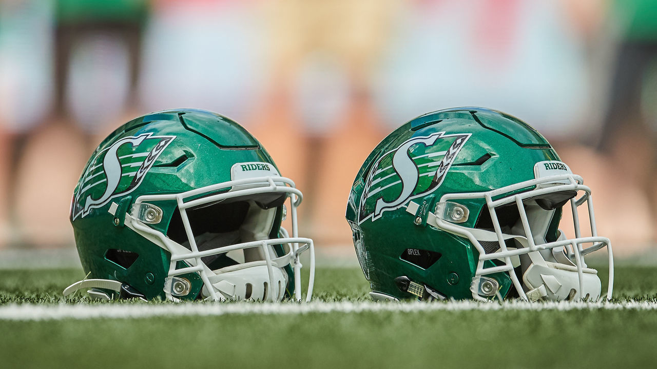 REGINA, SK - AUGUST 24: Detail shot of Roughrider helmets on the field before the game between the Ottawa RedBlacks and Saskatchewan Roughriders at Mosaic Stadium on August 24, 2019 in Regina, Canada.