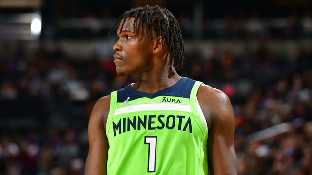 PHOENIX, AZ - JANUARY 28: Anthony Edwards #1 of the Minnesota Timberwolves looks on during the game against the Phoenix Suns on January 28, 2022 at Footprint Center in Phoenix, Arizona. Mandatory Copyright Notice: Copyright 2022 NBAE