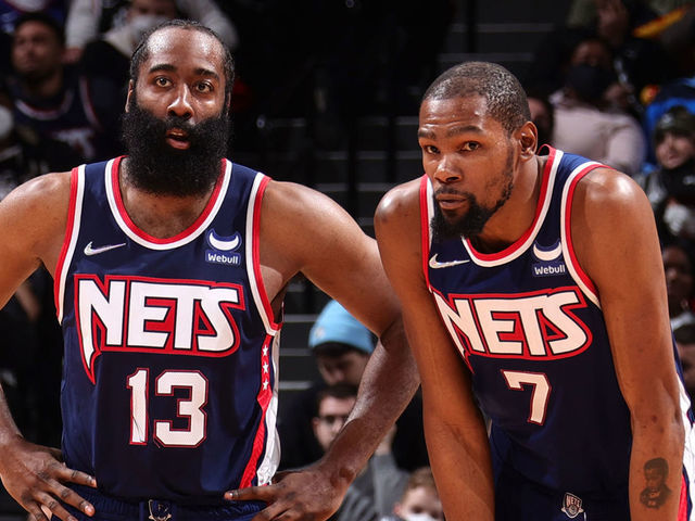 BROOKLYN, NY - JANUARY 1: James Harden #13 and Kevin Durant #7 of the Brooklyn Nets look on during the game against the LA Clippers on January 1, 2022 at Barclays Center in Brooklyn, New York. Mandatory Copyright Notice: Copyright 2021 NBAE