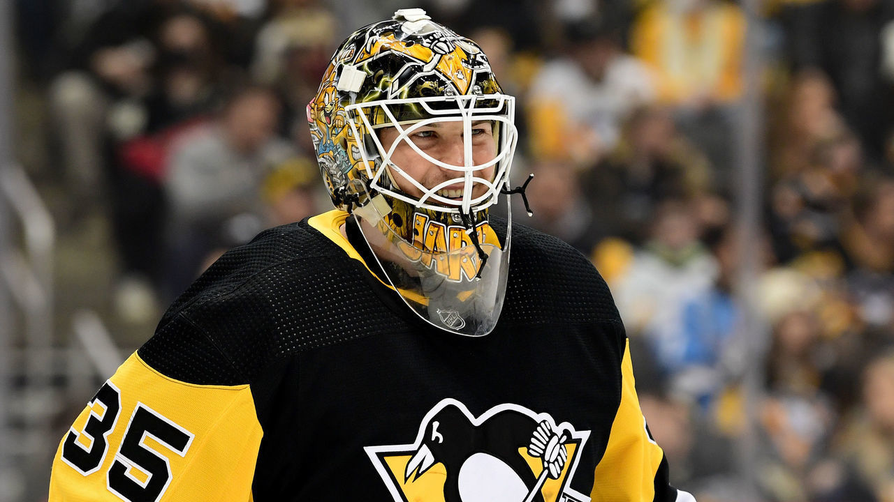PITTSBURGH, PENNSYLVANIA - JANUARY 25: Tristan Jarry #35 of the Pittsburgh Penguins smiles during the first period against the Arizona Coyotes at PPG PAINTS Arena on January 25, 2022 in Pittsburgh, Pennsylvania.