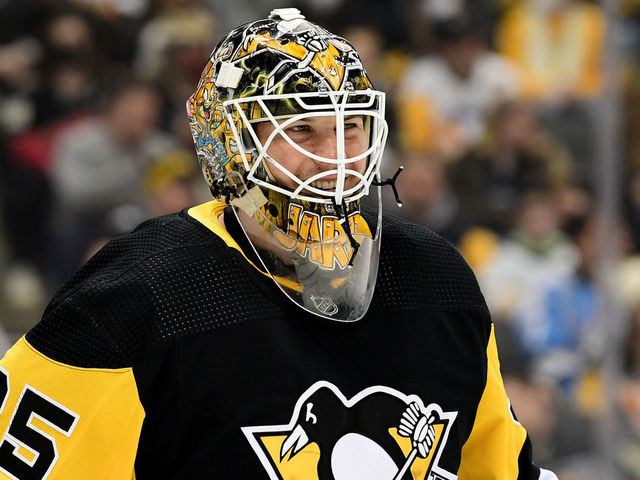 PITTSBURGH, PENNSYLVANIA - JANUARY 25: Tristan Jarry #35 of the Pittsburgh Penguins smiles during the first period against the Arizona Coyotes at PPG PAINTS Arena on January 25, 2022 in Pittsburgh, Pennsylvania.