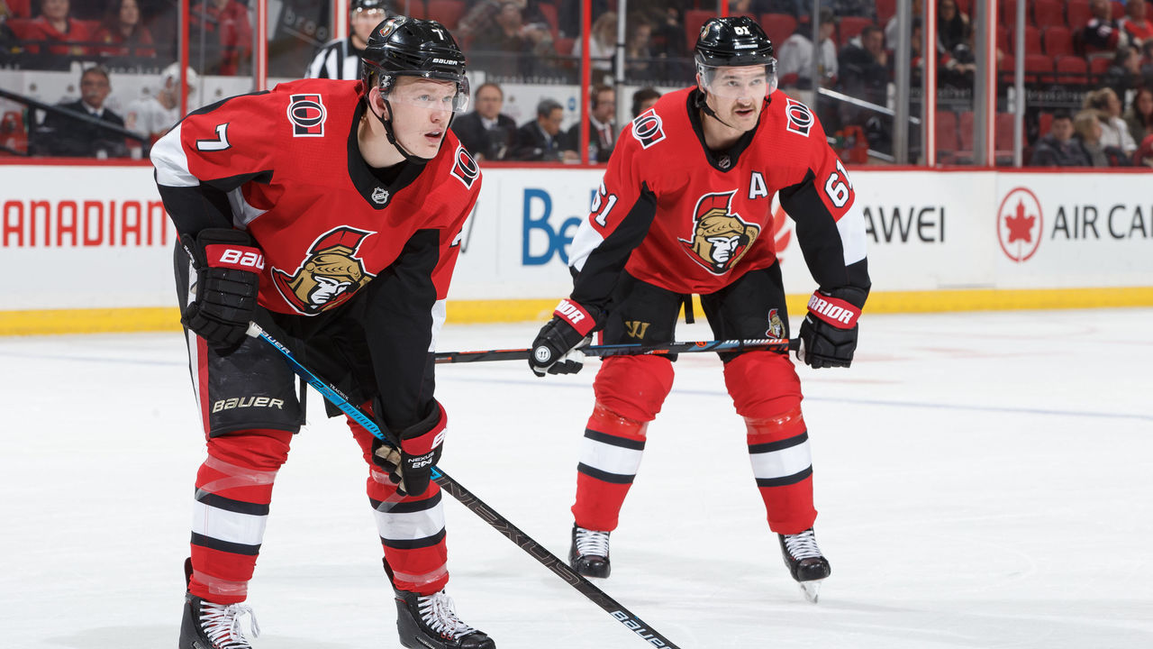 OTTAWA, ON - NOVEMBER 19: Brady Tkachuk #7 and Mark Stone #61 of the Ottawa Senators prepare for a faceoff against the Florida Panthers at Canadian Tire Centre on November 19, 2018 in Ottawa, Ontario, Canada.