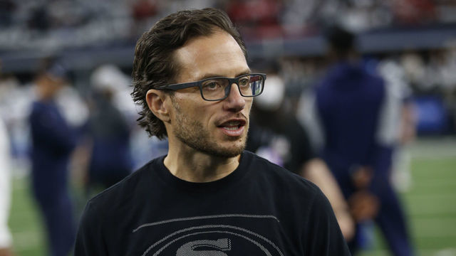 ARLINGTON, TX - JANUARY 16: Offensive Coordinator Mike McDaniel of the San Francisco 49ers on the field before the NFC Wild Card Playoff game against the Dallas Cowboys at AT&T Stadium on January 16, 2022 in Arlington, Texas. The 49ers defeated the Cowboys 23-17.