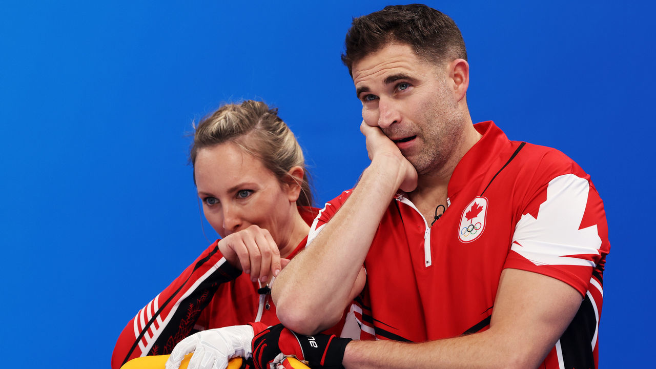 BEIJING, CHINA - FEBRUARY 06: John Morris and Rachel Homan of Team Canada look on as they compete against Team Australia during the Curling Mixed Doubles Round Robin on Day 2 of the Beijing 2022 Winter Olympics at National Aquatics Centre on February 06, 2022 in Beijing, China.
