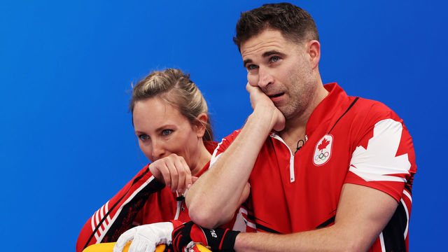 BEIJING, CHINA - FEBRUARY 06: John Morris and Rachel Homan of Team Canada look on as they compete against Team Australia during the Curling Mixed Doubles Round Robin on Day 2 of the Beijing 2022 Winter Olympics at National Aquatics Centre on February 06, 2022 in Beijing, China.