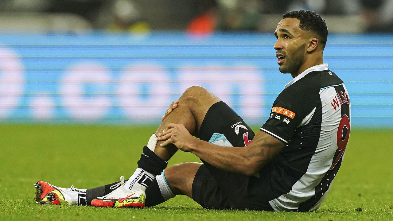 Newcastle United's Callum Wilson goes down with an injury during the Premier League match at St. James' Park, Newcastle. Picture date: Monday December 27, 2021.