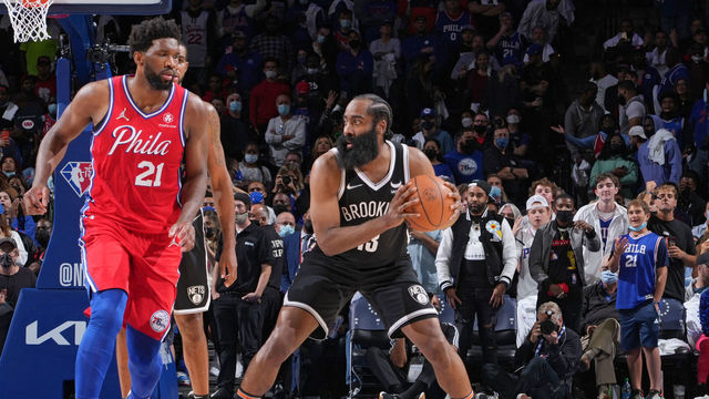 PHILADELPHIA, PA - OCTOBER 22: James Harden #13 of the Brooklyn Nets handles the ball against Joel Embiid #21 of the Philadelphia 76ers on October 22, 2021 at Wells Fargo Center in Philadelphia, Pennsylvania. NOTE TO USER: User expressly acknowledges and agrees that, by downloading and/or using this Photograph, user is consenting to the terms and conditions of the Getty Images License Agreement. Mandatory Copyright Notice: Copyright 2021 NBAE