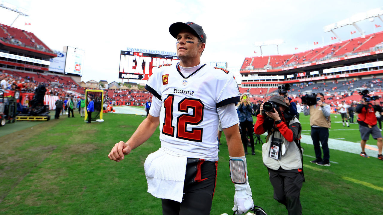 TAMPA, FLORIDA - JANUARY 16: Tom Brady #12 of the Tampa Bay Buccaneers celebrates after defeating the Philadelphia Eagles in the NFC Wild Card Playoff game at Raymond James Stadium on January 16, 2022 in Tampa, Florida.