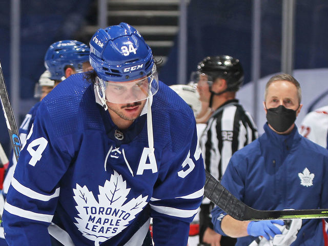 TORONTO, ON - FEBRUARY 7: Auston Matthews #34 of the Toronto Maple Leafs is injured late in the game against the Carolina Hurricanes during an NHL game at Scotiabank Arena on February 7, 2022 in Toronto, Ontario, Canada. The Maple Leafs defeated the Hurricanes 4-3 in overtime.