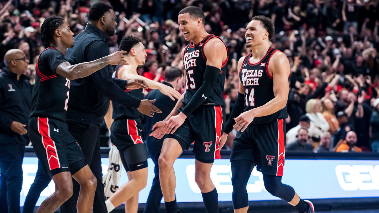 LUBBOCK, TEXAS - FEBRUARY 01: Guard Kevin McCullar #15 of the Texas Tech Red Raiders celebrates after a made shot during the first half of the college basketball game against the Texas Longhorns at United Supermarkets Arena on February 01, 2022 in Lubbock, Texas.