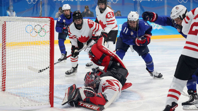 BEIJING, CHINA - FEBRUARY 08: Goaltender Ann-Renee Desbiens #35 of Team Canada covers the puck during the second period of the Group A Women's Preliminary Round ice hockey match between Team United States and Team Canada at Wukesong Sports Centre on February 08, 2022 in Beijing, China.
