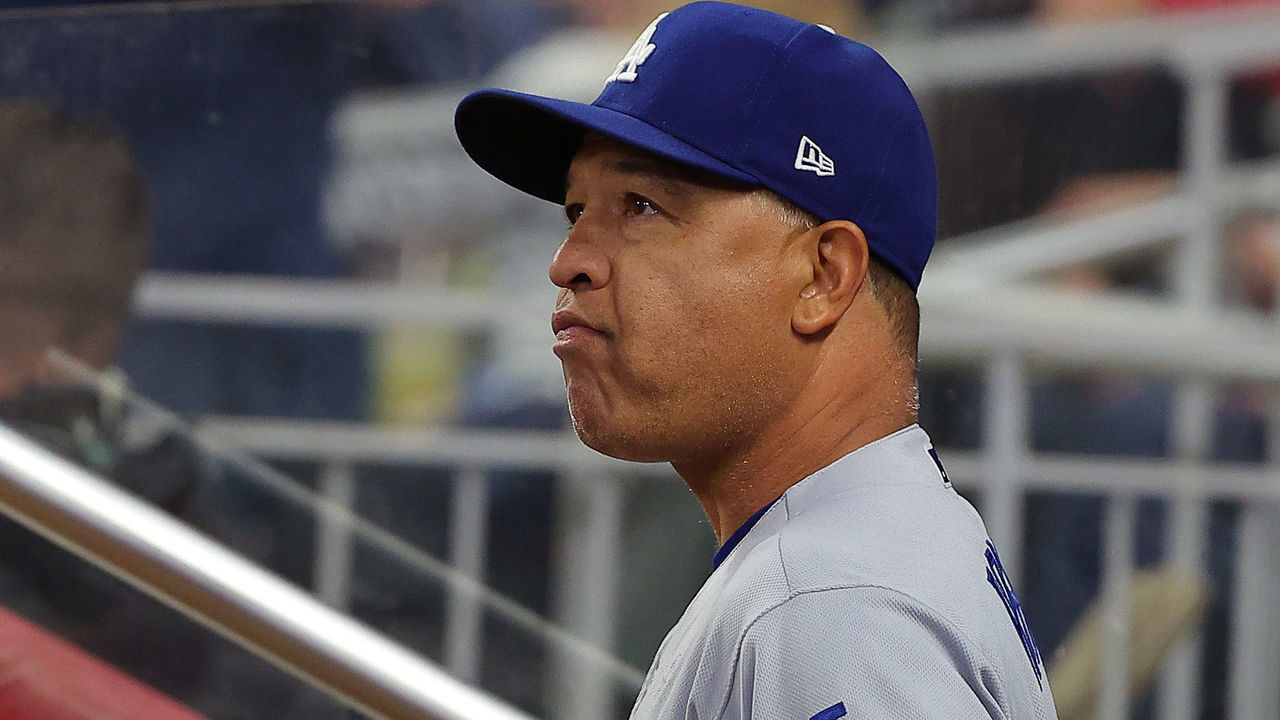 ATLANTA, GEORGIA - OCTOBER 16: Manager Dave Roberts #30 of the Los Angeles Dodgers looks on prior to Game One of the National League Championship Series against the Atlanta Braves at Truist Park on October 16, 2021 in Atlanta, Georgia.