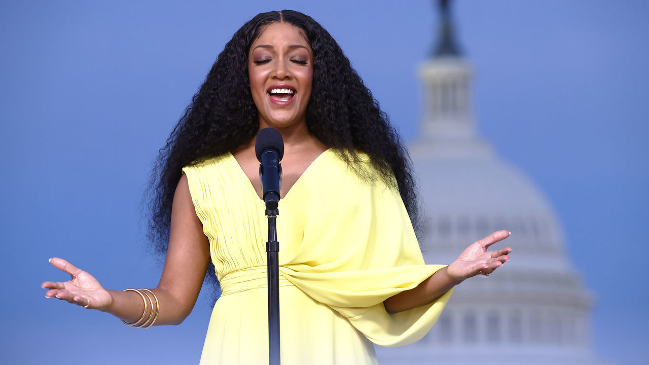 WASHINGTON, DC: In this image released on May 28, 2021, Country music star and Grammy-nominee Mickey Guyton performing the national anthem on stage at the Capital Concerts' "National Memorial Day Concert" in Washington, DC. The National Memorial Day Concert will be broadcast on May 30, 2021.