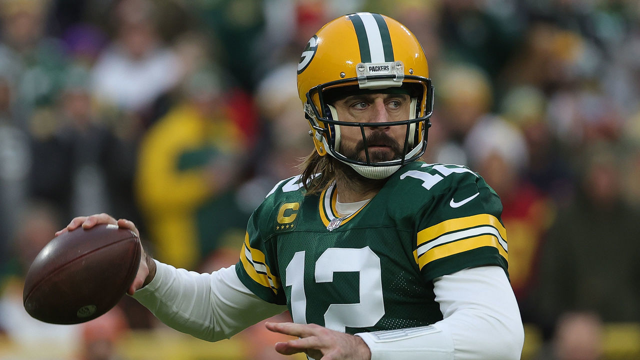 GREEN BAY, WISCONSIN - DECEMBER 25: Aaron Rodgers #12 of the Green Bay Packers drops back to pass during a game against the Cleveland Browns at Lambeau Field on December 25, 2021 in Green Bay, Wisconsin. The Packers defeated the Browns 24-22.