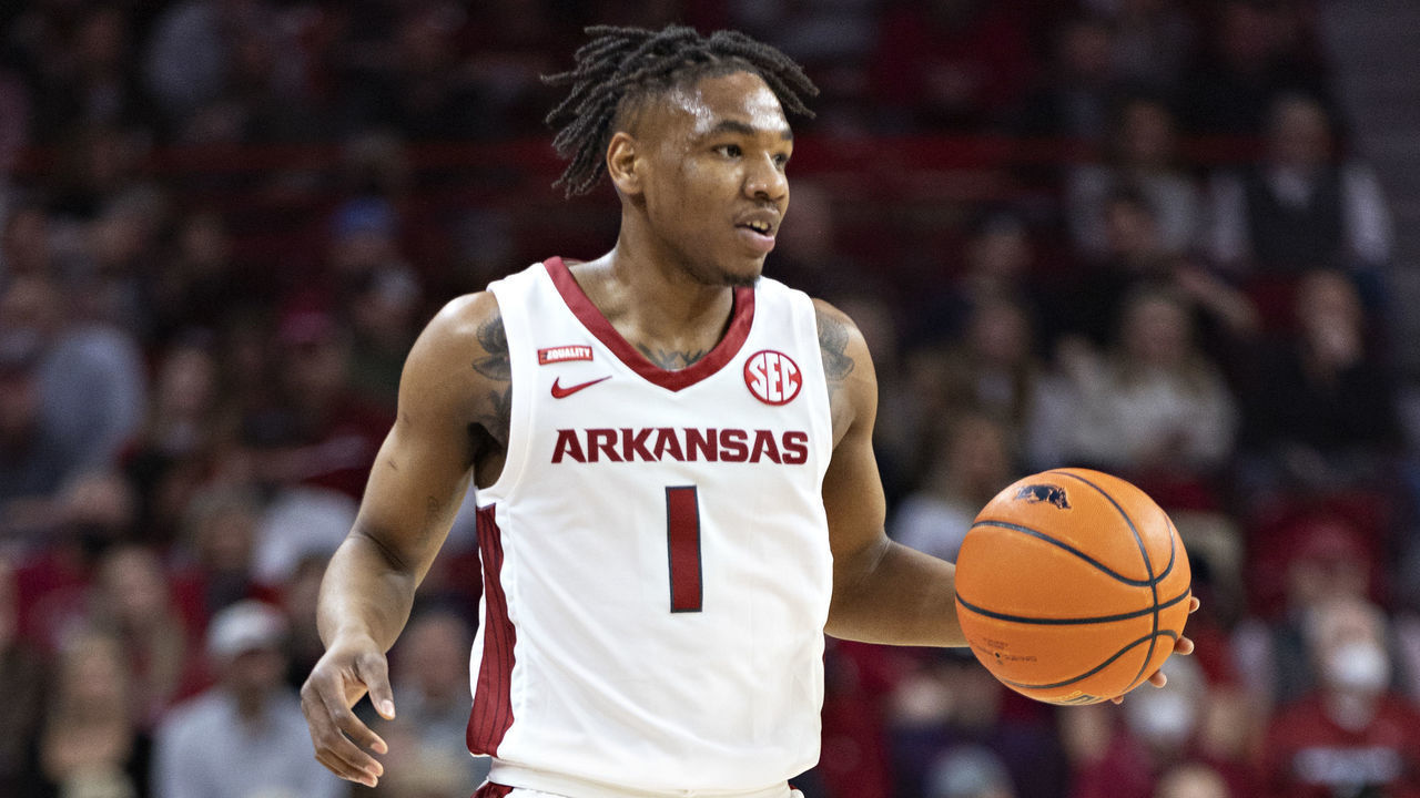 FAYETTEVILLE, ARKANSAS - FEBRUARY 05: JD Notae #1 of the Arkansas Razorbacks directs the offense during a game against the Mississippi State Bulldogs at Bud Walton Arena on February 05, 2022 in Fayetteville, Arkansas. The Razorbacks defeated the Bulldogs 63-55.