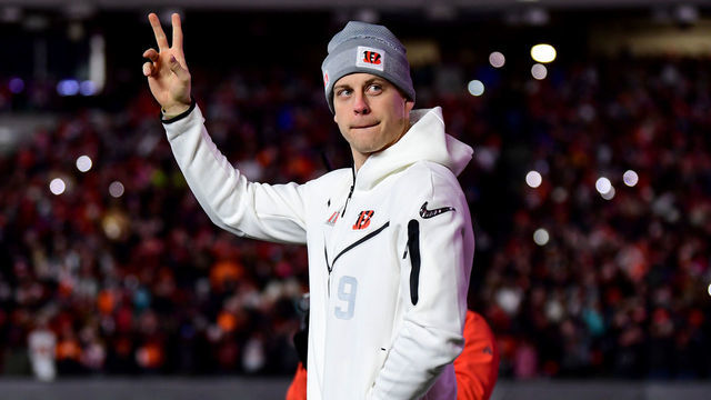 CINCINNATI, OHIO - FEBRUARY 07: Joe Burrow #9 of the Cincinnati Bengals walks onto the field as he is introduced during a Cincinnati Bengals Fan Rally ahead of Super Bowl LVI at Paul Brown Stadium on February 07, 2022 in Cincinnati, Ohio.