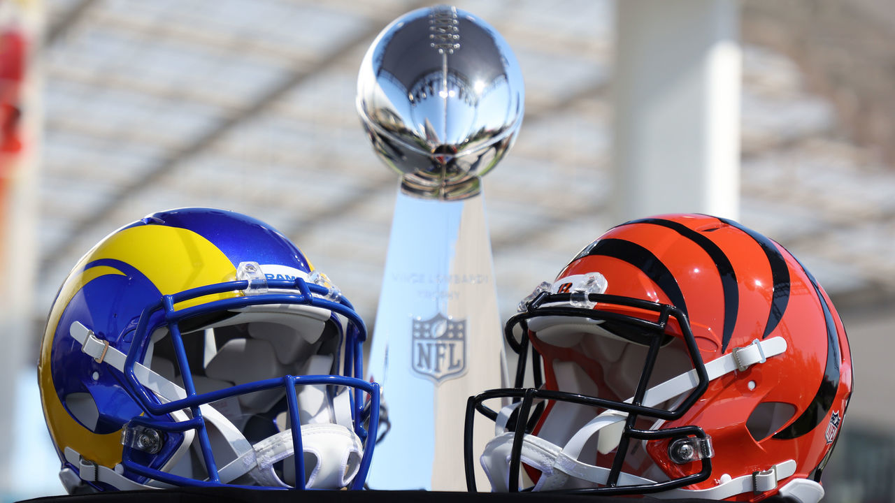 INGLEWOOD, CALIFORNIA - FEBRUARY 09: Helmets of the Los Angeles Rams and Cincinnati Bengals sit in front of the Lombardi Trophy as NFL Commissioner Roger Goodell addresses the media on February 09, 2022 at the NFL Network's Champions Field at the NFL Media Building on the SoFi Stadium campus in Inglewood, California.