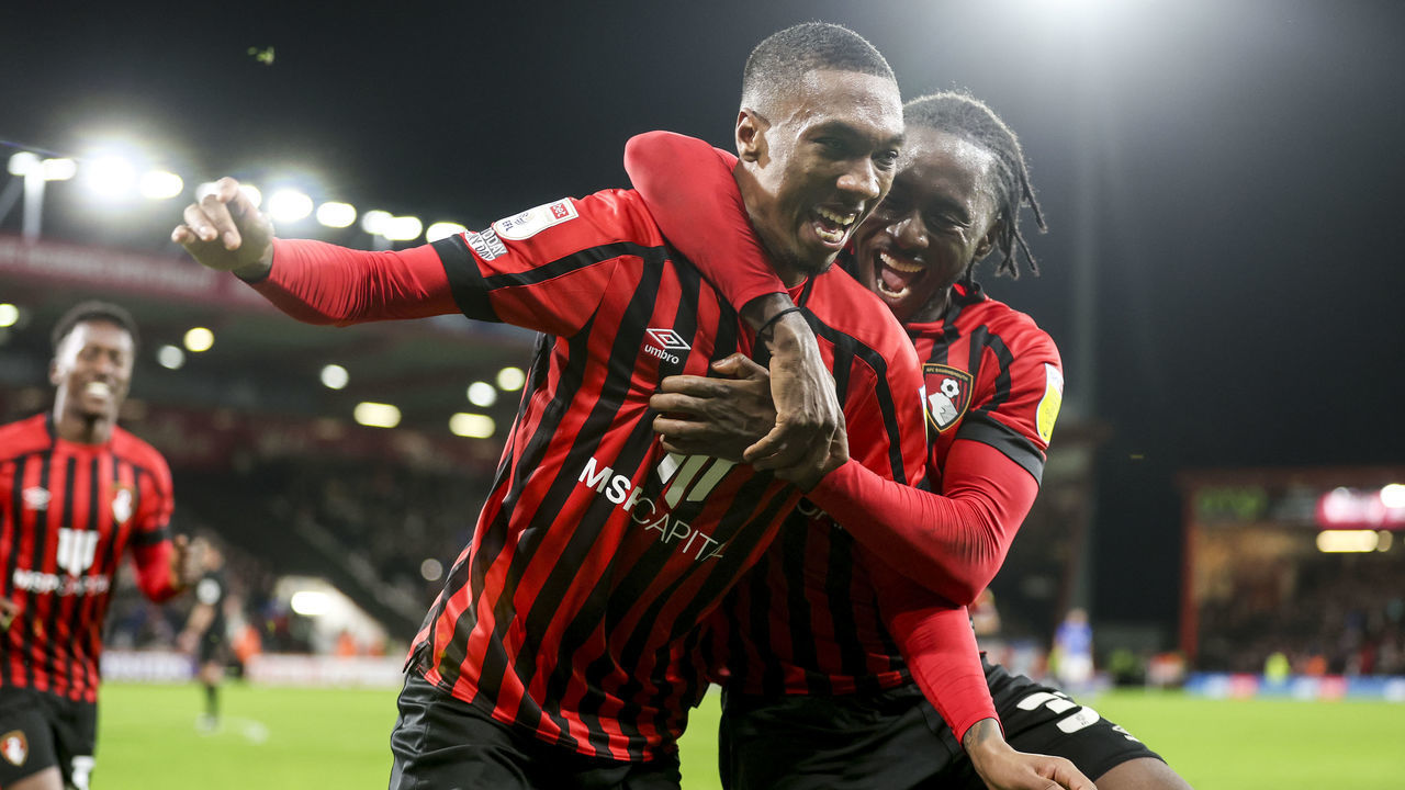 BOURNEMOUTH, ENGLAND - FEBRUARY 09: Jaidon Anthony of Bournemouth celebrates after he scores a goal to make it 3-1 with team-mate Jordan Zemura during the Sky Bet Championship match between AFC Bournemouth and Birmingham City at Vitality Stadium on February 09, 2022 in Bournemouth, England.