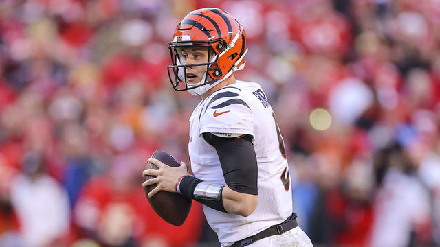KANSAS CITY, MO - JANUARY 30: Joe Burrow #9 of the Cincinnati Bengals looks for an open receiver in second quarter during the AFC Championship Game against the Kansas City Chiefs at Arrowhead Stadium on January 30, 2022 in Kansas City, Missouri, United States.